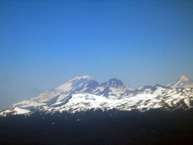 The Sisters through smoke filled skies