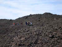 A Pacific Crest Outward Bound group hard on our heels across the remaining miles of lava.