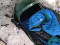 The North Face storm proof Soloist Bivy, classic Blue Kazoo 20 degree down bag, ThermaRest Guide-Lite three quarter pad and RidgeRest pad and Platypus one litre water bag.